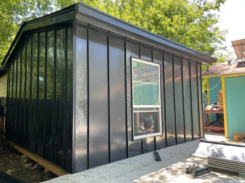 Black standing seam metal wall panels for Roof Inspection in Sarasota