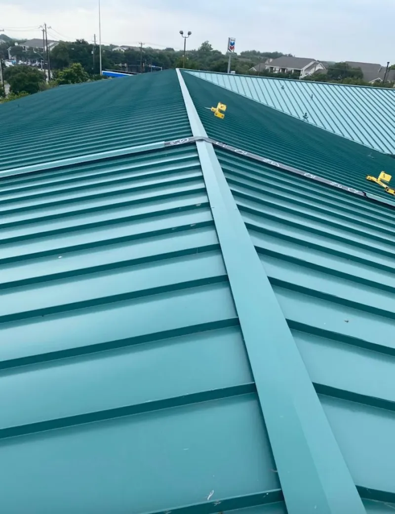 Green commercial metal roof ridge and valley for Metal Roof Repair in Sarasota